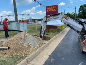 Plumber Performing Trenchless Sewer Repair